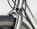 The rear lines run along the down tube for easy maintenance - the front brake line, however, is routed through the fork.