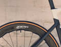 The wheels are from Zipp (see photo) or DT Swiss.
