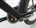 The rear brake is mounted barely visible under the bottom bracket