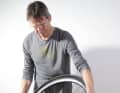 Place the inner tube completely on the rim and start to lift the tyre onto the rim opposite the valve. If necessary, reduce the pressure in the inner tube slightly, but it should retain its round shape as it is then less likely to get pinched.