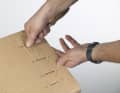 1. remove old locking clips that could injure you or damage the bike. Tear off old address labels or cover them completely and durably with new ones bearing your hotel or home address. Reinforce the base with pieces of cardboard so that nothing pushes through if the box gets damp.