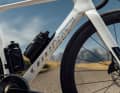 Aerodynamically integrated bottle holders are also included in the package; on the SL, however, these hold round bottles rather than the flattened, aerodynamic ones found on the SLR
