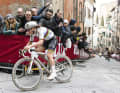 Lotte Kopecky on her way to victory at Strade Bianche