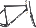 The frame can be split at two connection points, and the bike then fits into a corresponding transport case