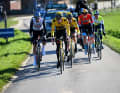A five-man leading group forms