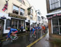 Typically British: Simon Yates (2nd from left) in typical weather and against a typical backdrop at his home race, the Tour of Britain 2012
