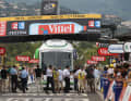 The bus gets stuck under the finishing arch and causes chaos