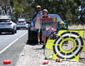 Fans had set up creative bottle collection stations along the way.