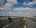 The breakaway riders looked lost on the wide roads. With 29 kilometres to go, they were caught.