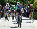 On the ascent to Camposauro, a large group breaks away, including the eventual winner Valentin Paret-Peintre (front)