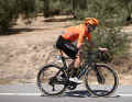 Xabier Isasa breaks away from the peloton as a solo breakaway rider