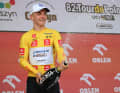 Paul Lapeira (Team Decathlon AG2R La Mondial) celebrated another day in the yellow jersey.