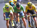 Tour de France 2016, stage 11: Sagan (2nd position) in the green jersey and Chris Froome (1st position) in the yellow jersey break up the peloton on a windward edge