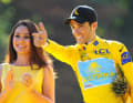 Alberto Contador with his "El Pistolero" pose at the podium ceremony in Paris.