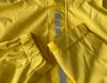 The collar closes well - the hood can be rolled up and stowed inside.
