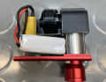 Vier Bauteile: Kompressor, Motor, Akku, Elektronik