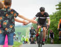 The MSR cyclists are often cheered on and greeted