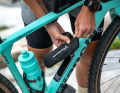 There is a "boot" in the down tube for small parts.