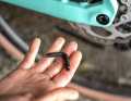 The rear thru axle conceals a four and five millimetre Allen key for minor repairs on the road.