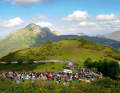 Open-air stage: fans wait for hours on the up to 24 per cent steep ramps of the Angliru to cheer on the racers