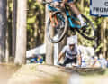 Showman: Mathieu van der Poel performs a tailwhip during the Mountain Bike World Cup in Nové Mĕsto, watched by world and European champion Nino Schurter