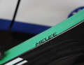 Each rider has a different colour on the down tube of the otherwise black frame.