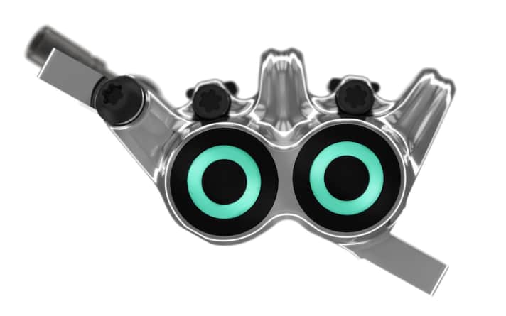   "Deine blauen Augen machen mich so sentimental", sang Annete Humpe mit Ideal in den 80ern. – Eine Herzensangelegenheit waren auch die Zierringe der MT-T in Türkis. Die hat sich Tibor Simai gewünscht, können aber auch getauscht werden. Der Bremssattel ist der gleiche wie an Maguras MT7. Bei unseren<a href="komponenten/bremsen/labor--und-praxistest-2016-mtb-scheibenbremsen/a34206.html"  rel="noopener noreferrer"> letzten Bremsen-Tests </a> überzeugte die Magura MT7 vor allem durch ihre brachiale Bremskraft.