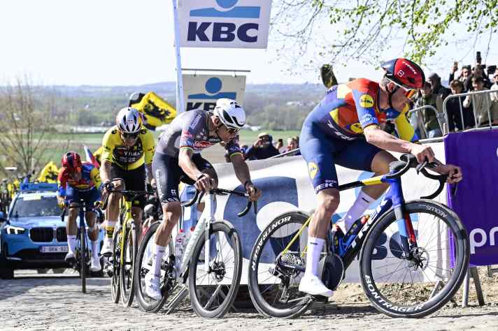 Belgian Wout van Aert of Team Visma-Lease a Bike, Dutch Mathieu van der Poel of Alpecin-Deceuninck and Danish Mads Pedersen of Lidl-Trek pictured in action on Paterberg during the men's race of the 'Ronde van Vlaanderen/ Tour des Flandres/ Tour of Flanders' one day cycling race, 268,9km from Brugge to Oudenaarde, Sunday 06 April 2025. BELGA PHOTO DIRK WAEM (Photo by DIRK WAEM / BELGA MAG / Belga via AFP) (Photo by DIRK WAEM/BELGA MAG/AFP via Getty Images)          