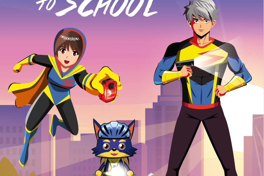 Sigma Ride Save to School: Die Charaktere Nyte, "Captain of Light", und Hiro, der "Safety Commander", sollen den smarten Waschbären Kota und damit stellvertretend alle Radfahrenden in jeder Situation sichtbar und sicher machen.