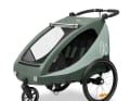 Er kann sowohl an das Fahrrad angehängt, als auch als Buggy dank vorderem Stützrad genutzt werden.
