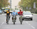Motorrad-Shuttle durch Teheran - der schnellste Weg zum Trail.
