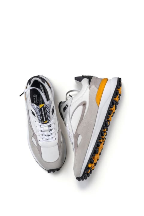 Sneaker im Jumbo-Visma-Teamdesign von Floris van Bommel